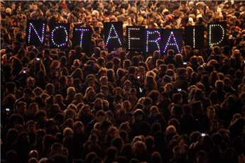 People gather in solidarity for the victims of a terror attack against the satirical newspaper Charlie Hebdo in Paris on Wednesday. AP